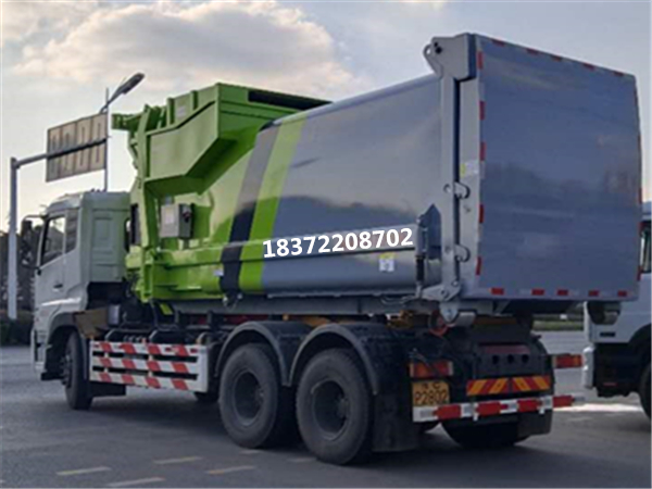 貴州苗族向我公司定購4臺東風(fēng)天龍25噸勾臂式垃圾車暨20方移動垃圾壓縮站